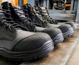 Industrial black safety shoes with reinforced toe by Safety Shoes Manufacturer – DSK Safety